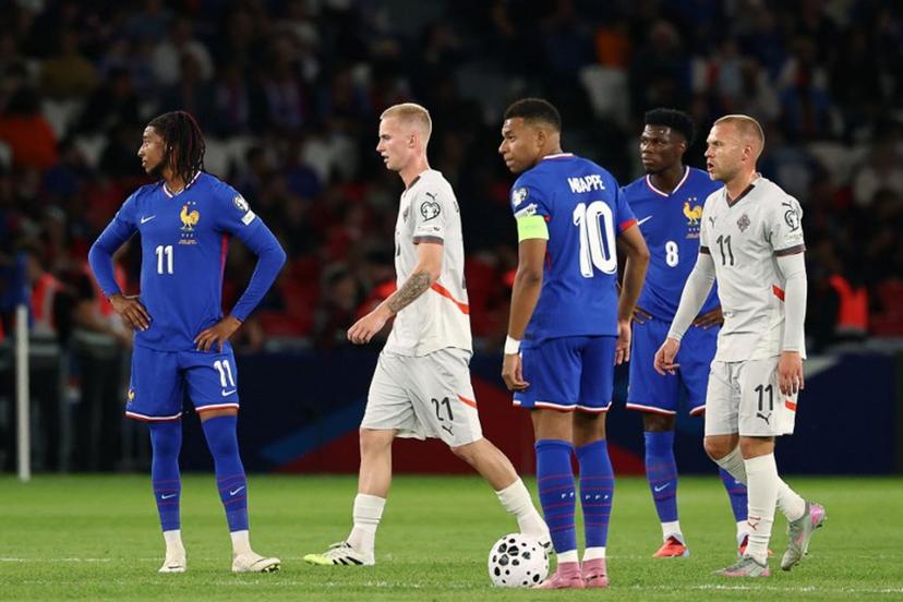 Iceland's forward #21 Daniel Gudjohnsen (2nd L) and Iceland's midfielder #11 Jon Dagur Thorsteinsson (R) reacts next to France's forward #11 Michael Olise (L), France's forward #10 Kylian Mbappe (C) and France's midfielder #08 Aurelien Tchouameni (2nd R) after Iceland scored the opening goal  during the FIFA World Cup 2026 Group D European qualification football match between France and Iceland at the Parc des Princes stadium in Paris, on September 9, 2025.  FRANCK FIFE / AFP