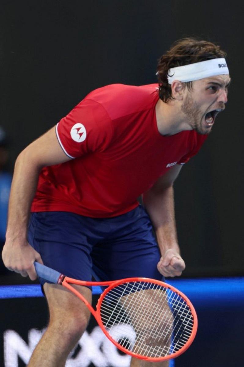 USA's Taylor Fritz celebrates after his victory against Spain's Jaume Munar during their men's singles match at the United Cup tennis tournament in Perth on January 5, 2026.  COLIN MURTY / AFP