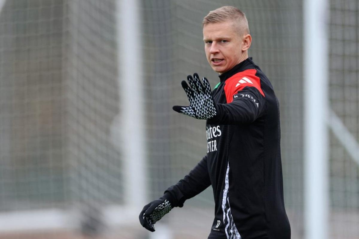 Arsenal's Ukrainian defender #17 Oleksandr Zinchenko takes part in a training session at the Arsenal Training centre in Shenley, north of London on November 5, 2024 on the eve of their UEFA Champions League football match against Inter Milan.  Adrian DENNIS / AFP
