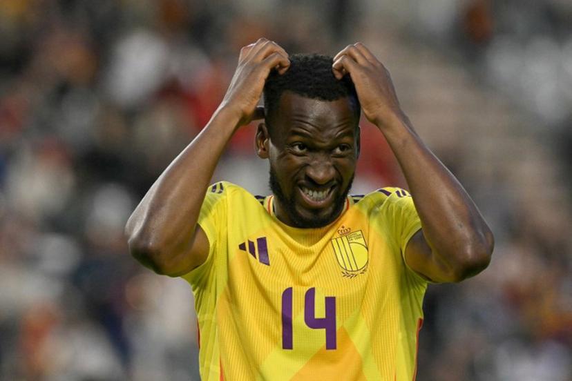 Belgium's midfielder #14 Dodi Lukebakio reacts after missing a goal scoring opportunity during the FIFA World Cup 2026 Group J European qualification football match between Belgium and Wales at the King Baudouin Stadium in Brussels, on June 9, 2025.  NICOLAS TUCAT / AFP