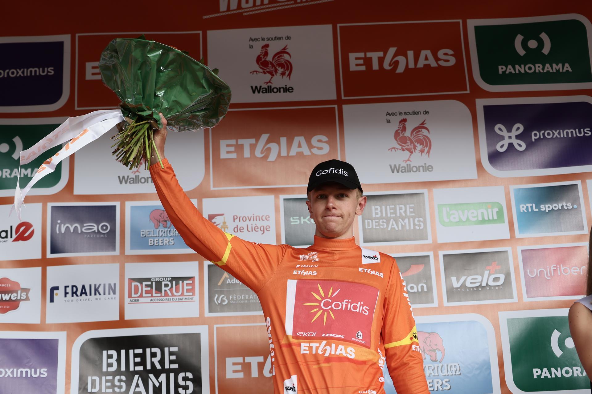British Oliver Knight of Cofidis celebrates on the podium after winning the second stage of the Tour De Wallonie cycling race, from Huy to Sambreville (153km), on Sunday 27 July 2025. BELGA PHOTO BRUNO FAHY