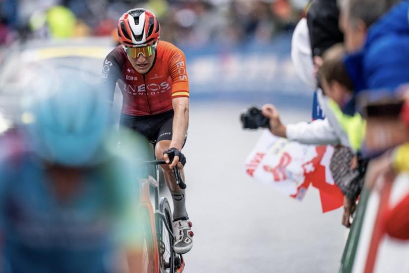 Ineos Grenadiers team's Spanish rider Carlos Rodriguez cycles to the finish line on 5th place of the fourth stage of the Tour of Romandie UCI cycling World tour, a 128,4 km from Sion to Thyon 2000, in Thyon, on May 3, 2025.   Maxime SCHMID / AFP