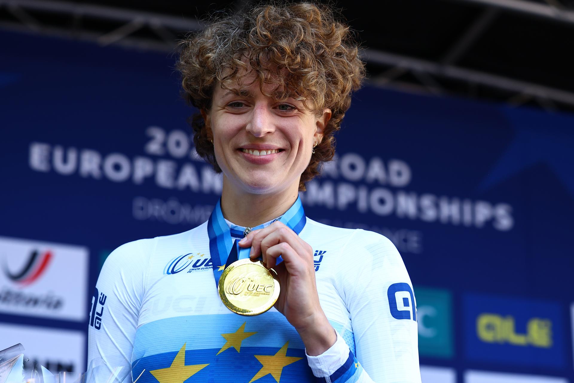 Swiss Marlen Reusser of Movistar Team and pictured on the podium after winning the 24 km time trial of the Women Elite category at the UEC road European cycling championships, Wednesday 01 October 2025, in Loriol-sur-Drome, France. The European cycling championships Drome-Ardeche takes place from 1 to 5 October, France. BELGA PHOTO DAVID PINTENS