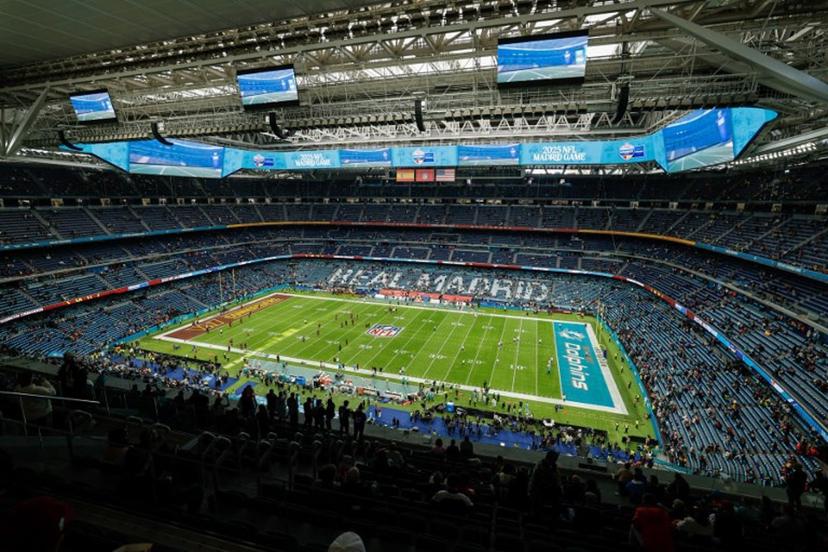 A general view shows the Santiago Bernabeu stadium before the NFL match between Miami Dolphins and Washington Commanders at Santiago Bernabeu Stadium in Madrid on November 16, 2025.  Oscar DEL POZO / AFP