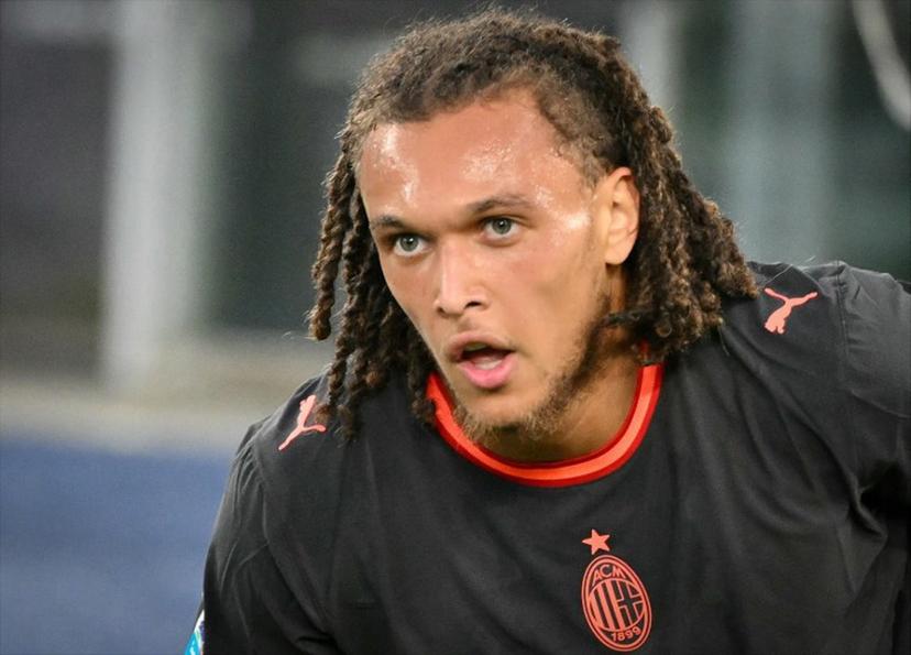 AC Milan's Belgian midfielder #22 Diego Moreira reacts after scoring Milan's second goal during the Italian Serie A football match between Lazio and AC Milan at the Olympic Stadium in Rome on September 12, 2026.  Alberto PIZZOLI / AFP