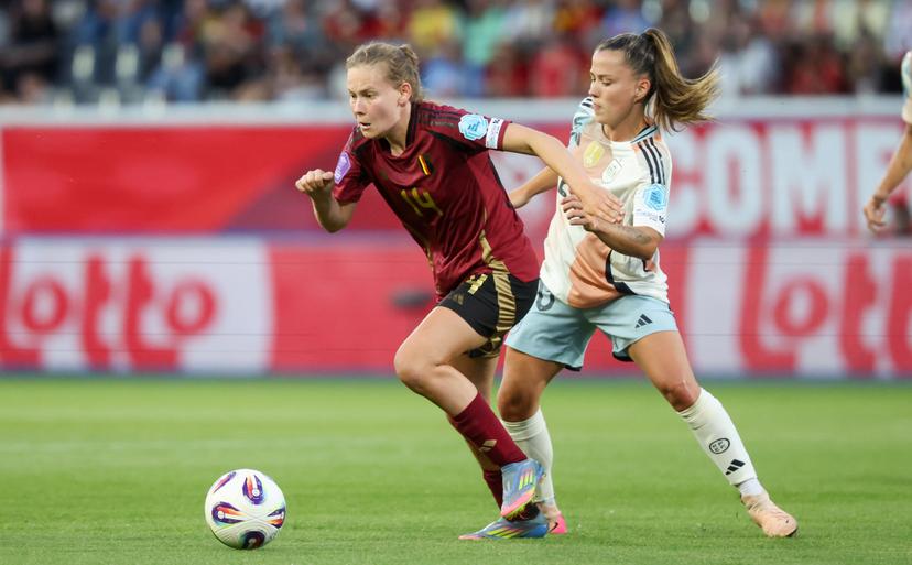 Belgium's Jarne Teulings and Spain's Claudia Pina fight for the ball during a soccer game between the national teams of Belgium (Red Flames) and Spain, on the fifth matchday in group A3 of the 2024-25 Women's Nations League competition, on Friday 30 May 2025 in Heverlee, Leuven. BELGA PHOTO VIRGINIE LEFOUR
