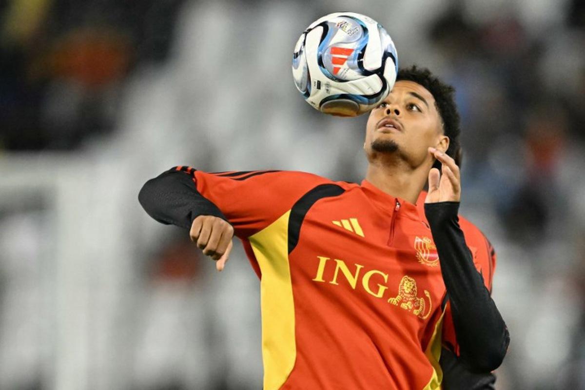 Belgium's defender #03 Koni De Winter takes part in the warm-up ahead of the UEFA Nations League Group A1 football match between Belgium and France at King Baudouin Stadium in Brussels on September 28, 2026.  NICOLAS TUCAT / AFP