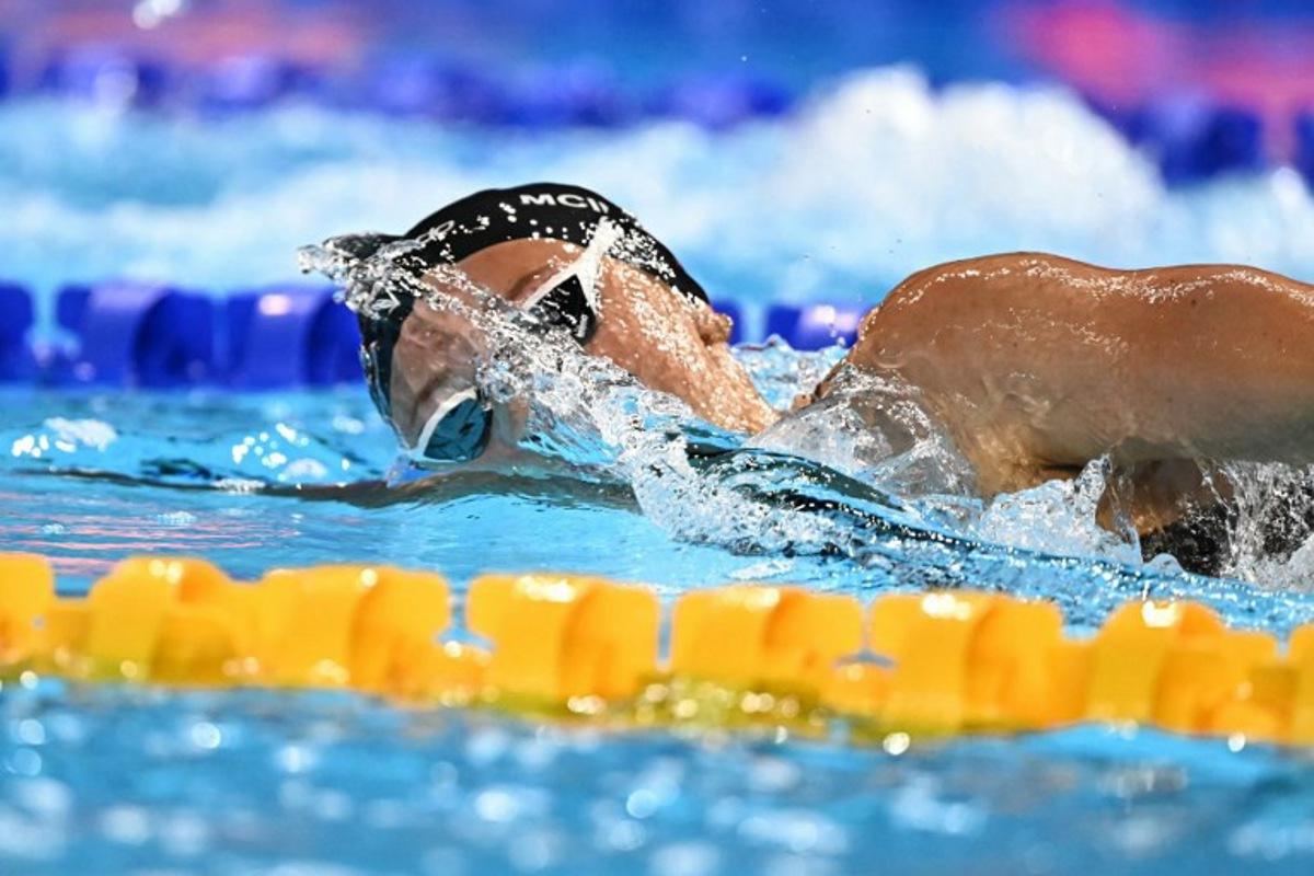 Canada's swimmer Summer Mcintosh competes in the final of the women's 400m freestyle swimming event during the 2025 World Aquatics Championships in Singapore on July 27, 2025.  MANAN VATSYAYANA / AFP