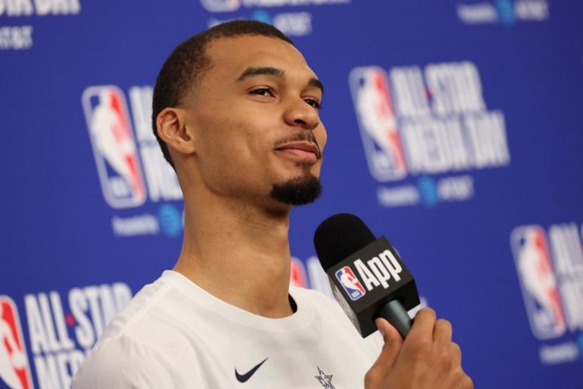 French basketball player Victor Wembanyama of the San Antonio Spurs speaks to the media during the NBA All-Star media day at the Intuit Dome in Inglewood, California, on February 14, 2026.  Patrick T. Fallon / AFP