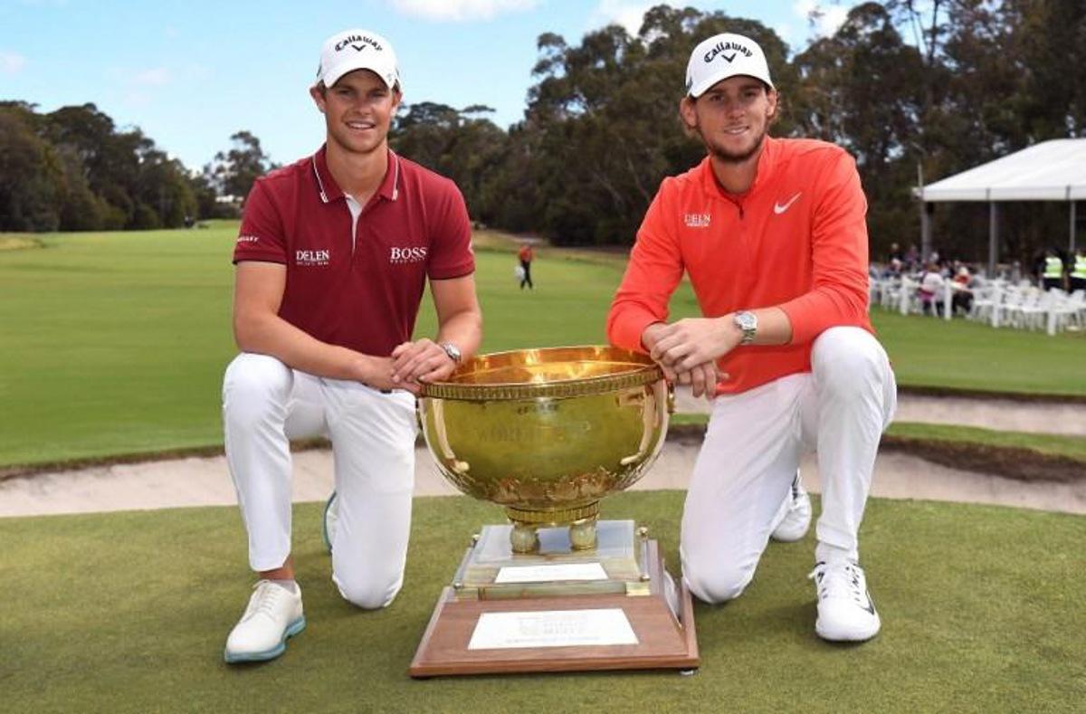Thomas Detry (L) and Thomas Pieters (R) of Belgium celebrate with the trophy after winning the World Cup of Golf at the Metropolitan Golf Club in Melbourne on November 25, 2018.  William WEST / AFP -- IMAGE RESTRICTED TO EDITORIAL USE - STRICTLY NO COMMERCIAL USE --

