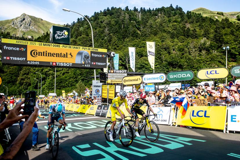 Slovenian Tadej Pogacar of UAE Team Emirates and Danish Jonas Vingegaard Hansen of Team Visma-Lease a Bike pictured in action during stage 10 of the 2025 Tour de France cycling, from Ennezat to Le Mont-Dore Puy de Sancy (169 km), on Monday 14 July 2025 in France. The 112th edition of the Tour de France starts on Saturday 5 July in Lille, France, and will finish in Paris, France on the 27th of July. BELGA PHOTO DAVID PINTENS