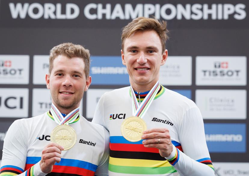 Belgian Fabio Van Den Bossche and Belgian Lindsay De Vylder celebrate on the podium after winning during the podium ceremony of the men's Madison race at the 2025 UCI Track World Championships cycling, in Santiago, Chile, Sunday 26 October 2025. The Track World Championships take place from 22 to 26 October at the Velodromo de Penalolen in Santiago, Chile. BELGA PHOTO BENOIT DOPPAGNE