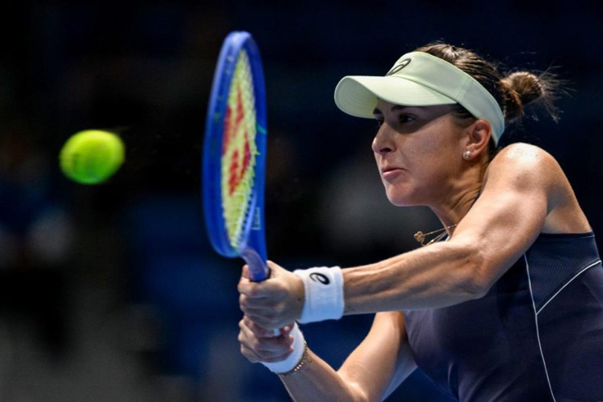 Switzerland's Belinda Bencic hits a return against Czech Republic's Karolina Muchova during their women's singles match at the Pan Pacific Open tennis tournament in Tokyo on October 24, 2025.  Philip FONG / AFP