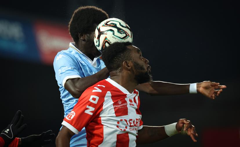 Seraing's Cheikou Omar Ndiaye and Kortrijk's Thierry Ambrose fight for the ball during a soccer game between KV Kortrijk and RFC Seraing, Saturday 13 December 2025 in Kortrijk, on day 17 of the 2025-2026 'Challenger Pro League' 1B second division of the Belgian championship. BELGA PHOTO VIRGINIE LEFOUR