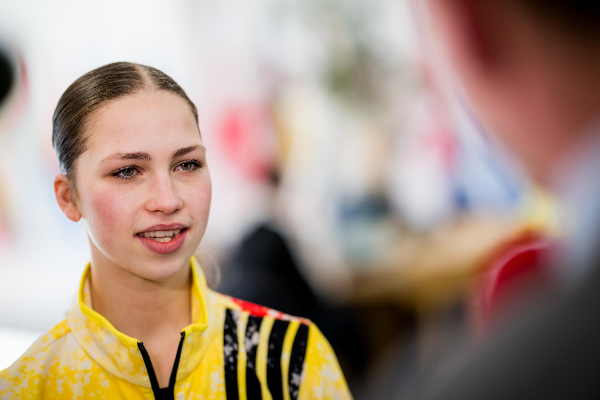 Belgian figure skater Nina Pinzarrone talks to the press during a press conference at the Milano Cortina 2026 Olympic Winter Games, on Sunday 15 February 2026 in Milan, Italy. The XXV Winter Olympics take place from 6 to 22 February 2026 in Italy. BELGA PHOTO JASPER JACOBS