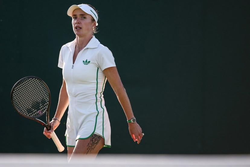 Ukraine's Elina Svitolina reacts as she plays against Belarus's Aliaksandra Sasnovich during their women's singles second round tennis match on the third day of the 2025 Wimbledon Championships at The All England Lawn Tennis and Croquet Club in Wimbledon, southwest London, on July 2, 2025.  HENRY NICHOLLS / AFP