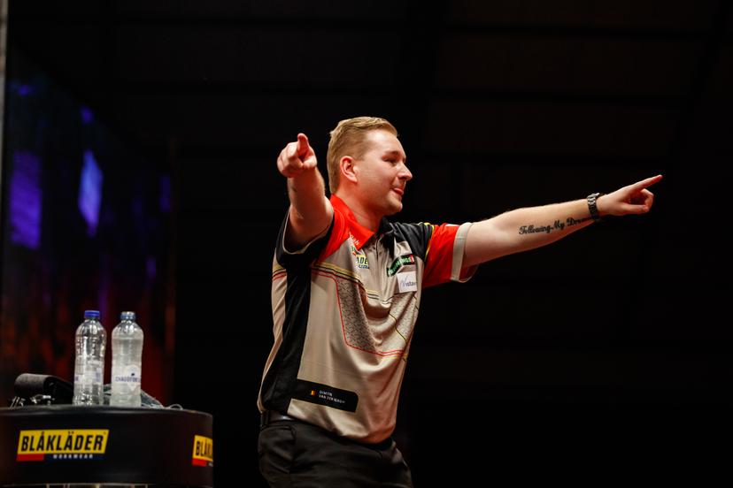 Belgian Dimitri Van den Bergh celebrates on the second day of the Belgian Darts Open, a tournament in the European Tour that takes places from September 23 until September 25 in Wieze, Saturday 24 September 2022. BELGA PHOTO JEF MATTHEE