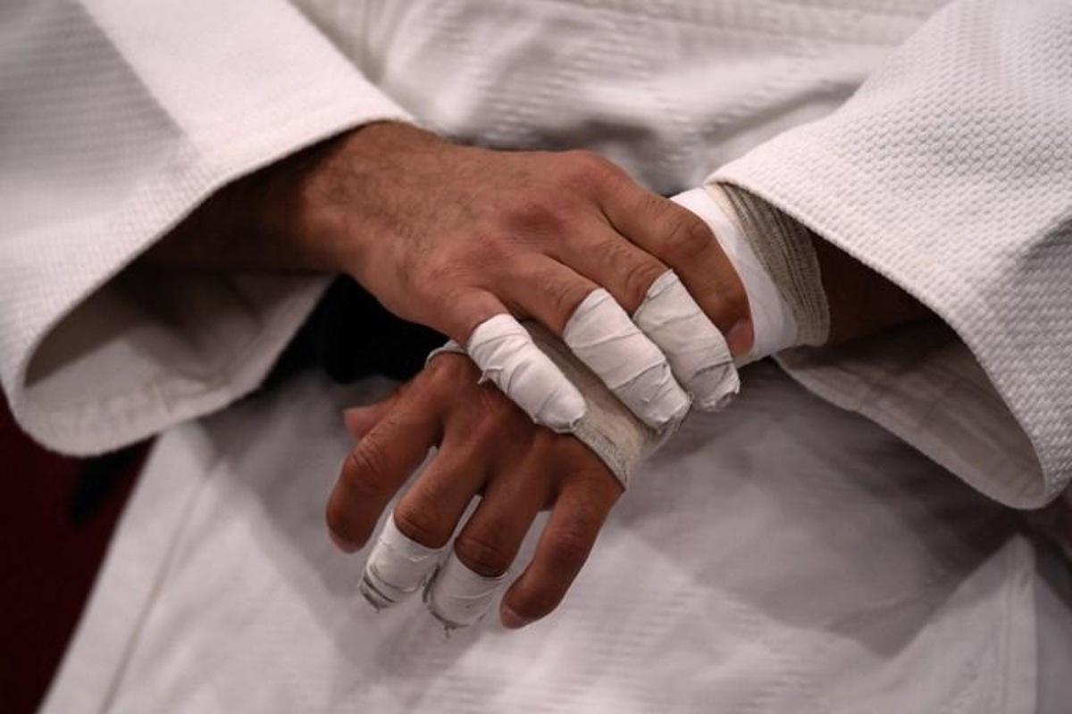 A judoka gets ready for a bout during the Tokyo 2020 Olympic Games at the Nippon Budokan in Tokyo on July 25, 2021.  Franck FIFE / AFP
