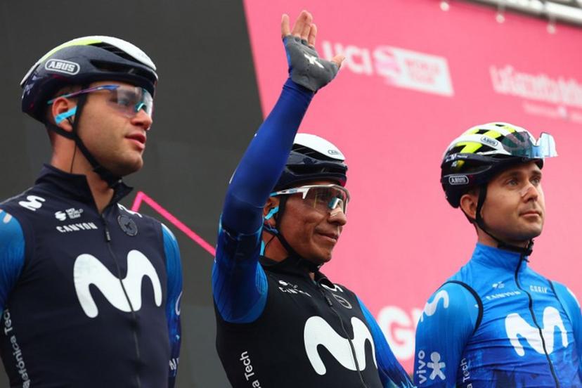 Team Movistar's Colombian rider Nairo Quintana (C) waves flanked by his teammates before the start of the 20th stage of the 107th Giro d'Italia cycling race, 184km between Alpago and Bassano del Grappa on May 25, 2024.  Luca Bettini / AFP