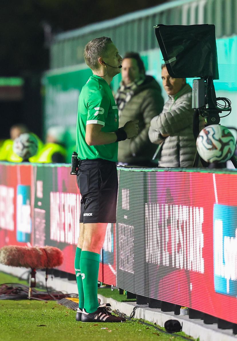referee Bert Put pictured watching a scene on the VAR video assistant referee screen during a soccer match between RAAL La Louviere and Cercle Brugge, Sunday 02 November 2025 in La Louviere, on day 13 of the 2025-2026 'Jupiler Pro League' first division of the Belgian championship. BELGA PHOTO VIRGINIE LEFOUR