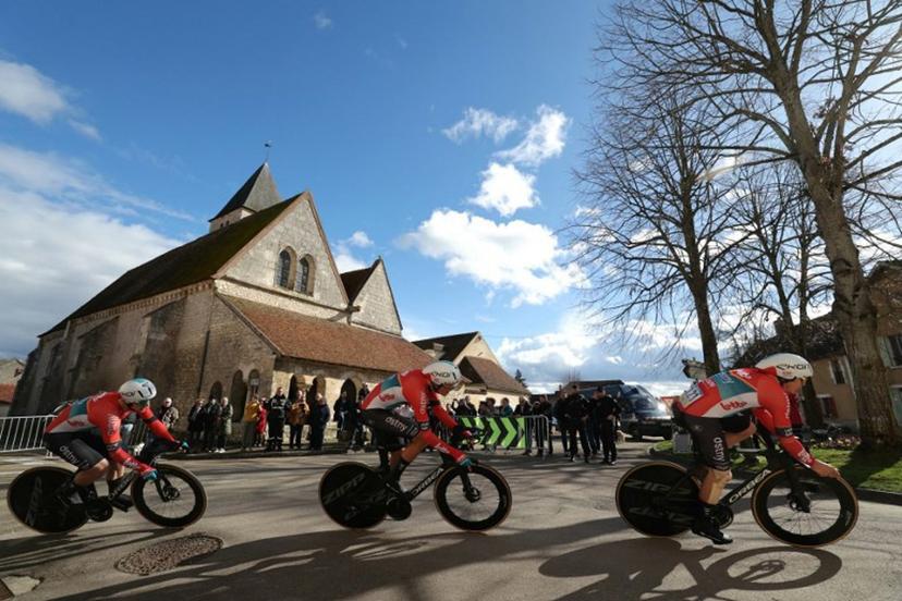 Lotto-DSTNY's team competes during the 3rd stage of the Paris-Nice cycling race, 26,9 km team time trial between Auxerre and Auxerre, on March 5, 2024.  Thomas SAMSON / AFP