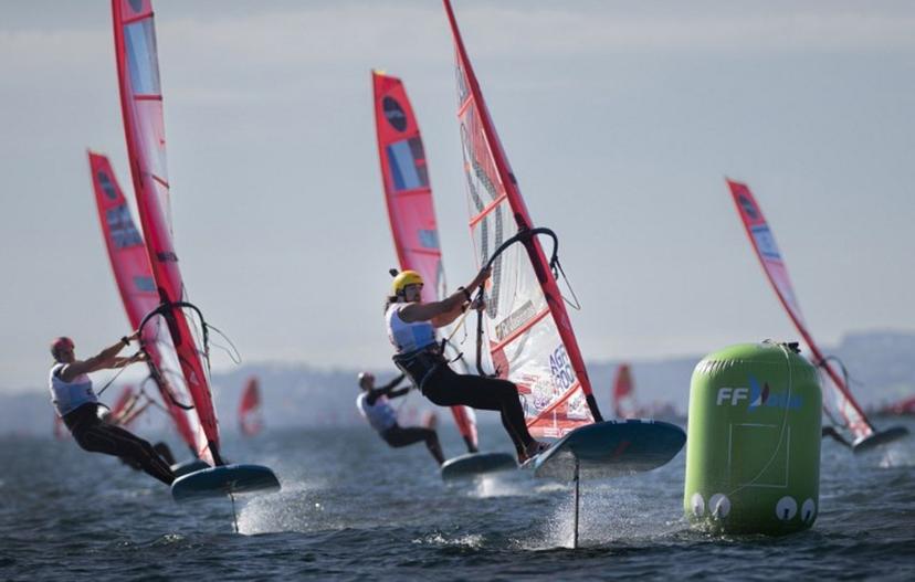 This photograph taken on October 20, 2022, shows competitors sailing during the IQFoil World Championships in Brest, western France. Designated an olympic discipline in 2019, IQFoil will make its appearance for the first time in the program of the Paris 2024 Olympic Games. FRED TANNEAU / AFP