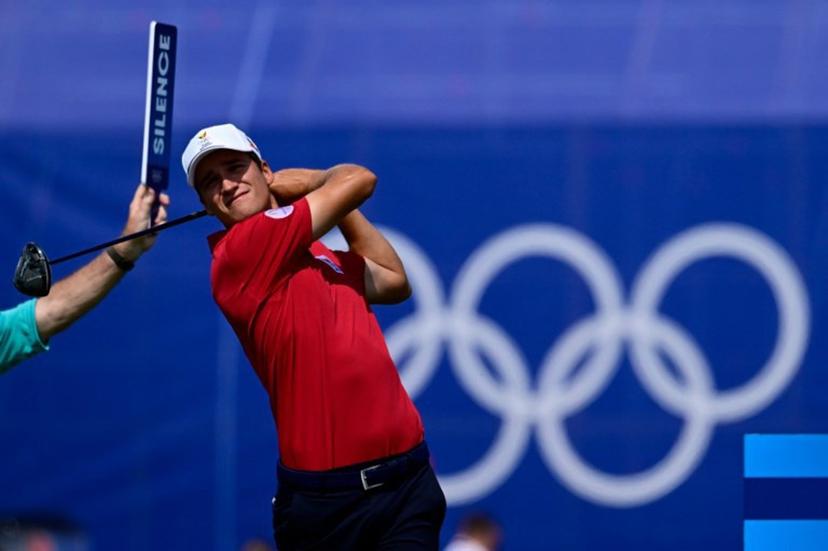 Belgium's Adrien Dumont de Chassart tees off in round 2 of the men's golf individual stroke play of the Paris 2024 Olympic Games at Le Golf National in Guyancourt, south-west of Paris on August 2, 2024.   John MACDOUGALL / AFP