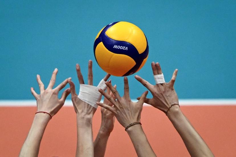 China's players attempt to block a ball in the women's gold medal volleyball event against Japan during the Hangzhou 2022 Asian Games in Hangzhou, in China's eastern Zhejiang province on Octorber 7, 2023.  WANG Zhao / AFP