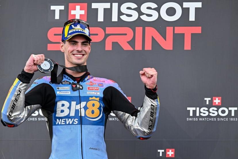 Second-placed BK8 Gresini Racing MotoGP team's Spanish MotoGP rider Fermin Aldeguer celebrates on the podium after the Sprint Race at the MotoGP Indonesian Grand Prix at the Mandalika International Circuit in Mandalika, West Nusa Tenggara on October 4, 2025.  SONNY TUMBELAKA / AFP