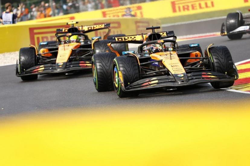 McLaren's Australian driver Oscar Piastri drives ahead of  McLaren's British driver Lando Norris during the Formula One Belgian Grand Prix at the Spa-Francorchamps circuit in Spa, on July 27, 2025.  SIMON WOHLFAHRT / AFP
