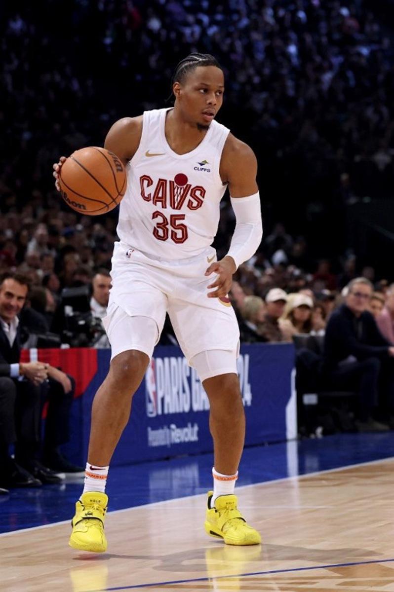 Cleveland Cavaliers' US Point Guard Isaac Okoro controls the ball during the NBA regular season basketball match between the Cleveland Cavaliers and the Brooklyn Nets at the Accor Arena in Paris on January 11, 2024.  Emmanuel Dunand / AFP