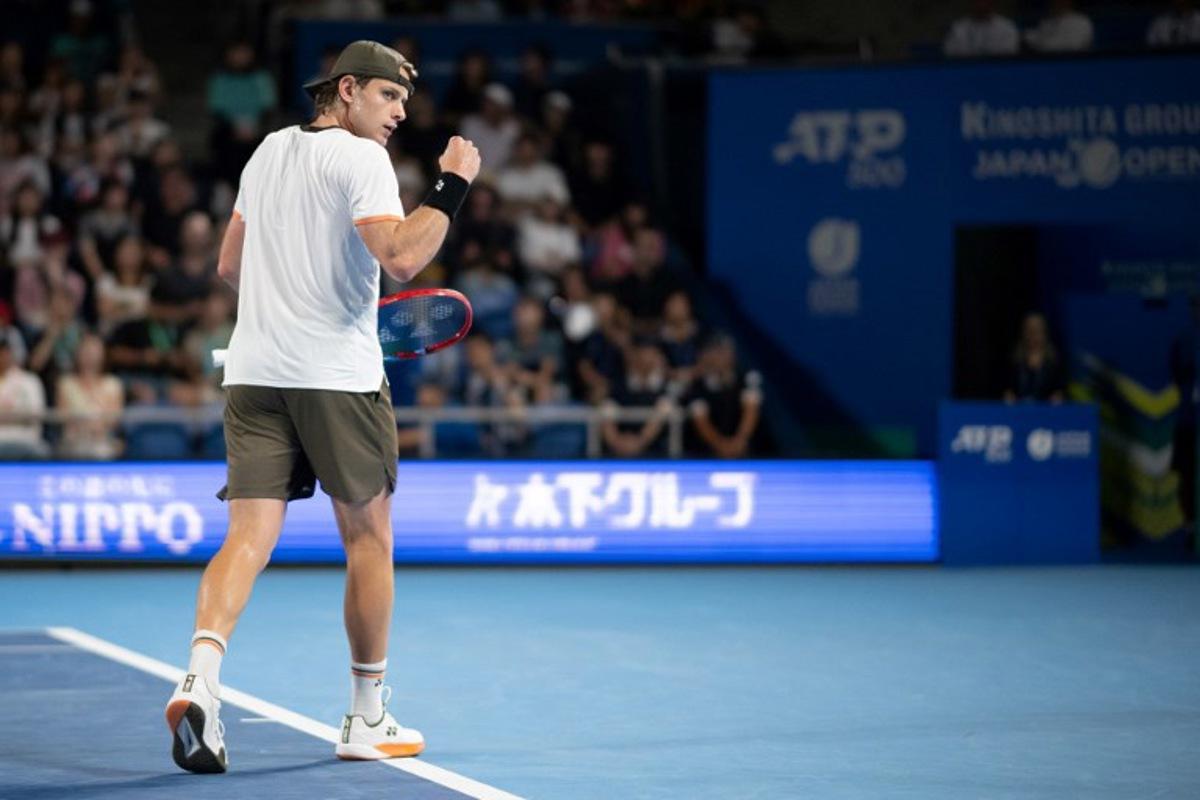 Belgium's Zizou Bergs reacts during his men's singles match against Spain's Carlos Alcaraz at the ATP Japan Open tennis tournament in Tokyo on September 27, 2025.  Philip FONG / AFP