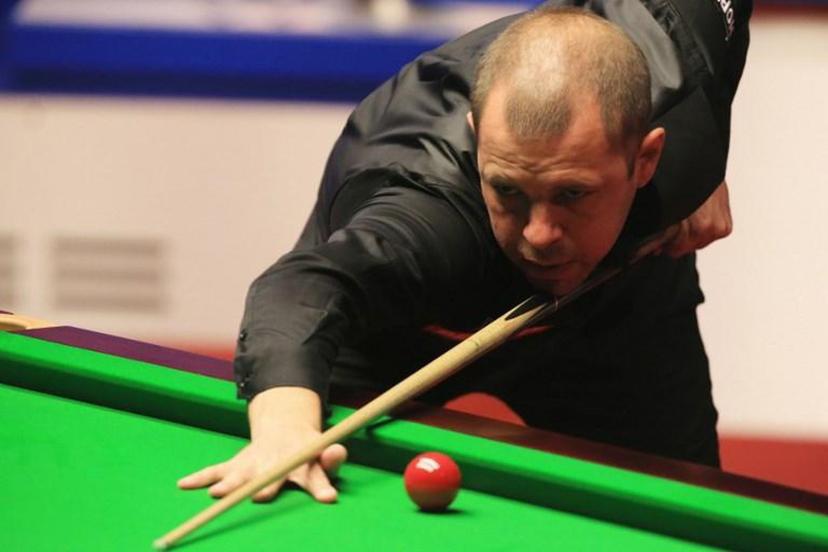 England's Barry Hawkins plays a shot during the World Championship Snooker semi-final match against Wales's Mark Williams at The Crucible in Sheffield, England on May 3, 2018.   Paul ELLIS / AFP