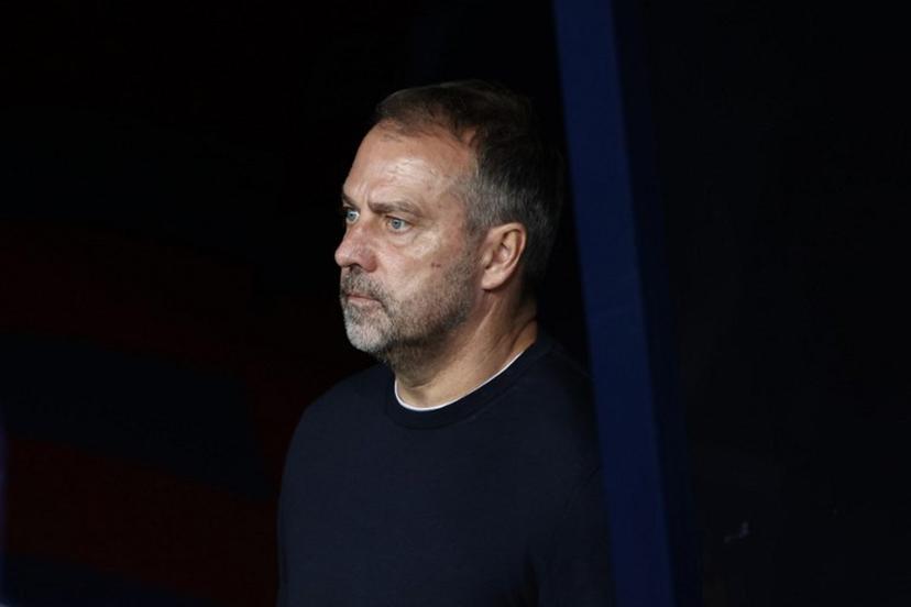 Barcelona's German coach Hans-Dieter Flick looks on during the UEFA Champions League league phase match-day 3 football match between FC Barcelona and Olympiakos FC at Estadi Olimpic Lluis Companys in Barcelona on October 21, 2025.  Josep LAGO / AFP