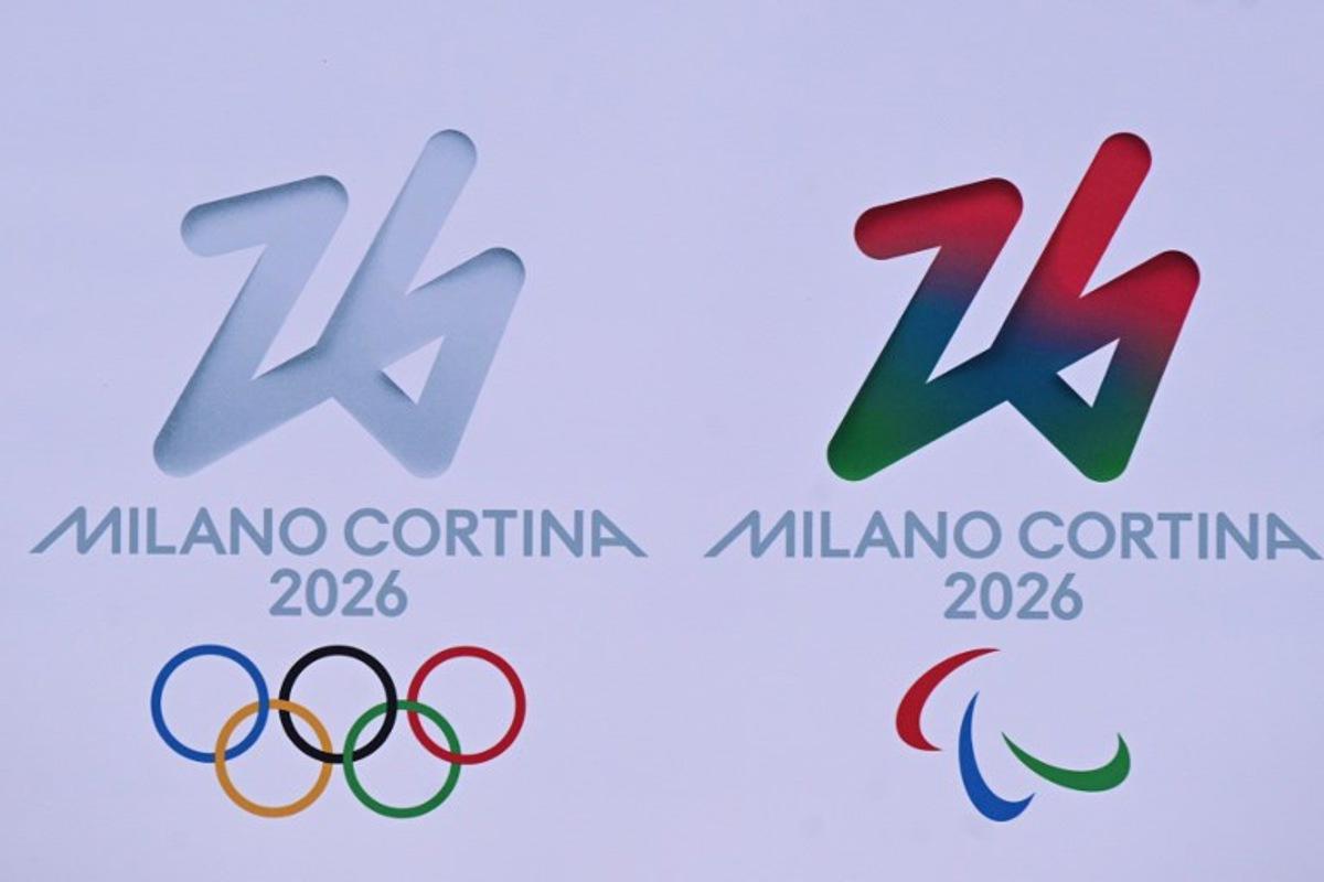 A picture shows the Milano Cortina 2026 Olympics and Paralympics logo in Cortina d'Ampezzo, one of the host cities of Milano Cortina 2026 Olympic and Paralympic Games, on January 17, 2025.  Tiziana FABI / AFP
