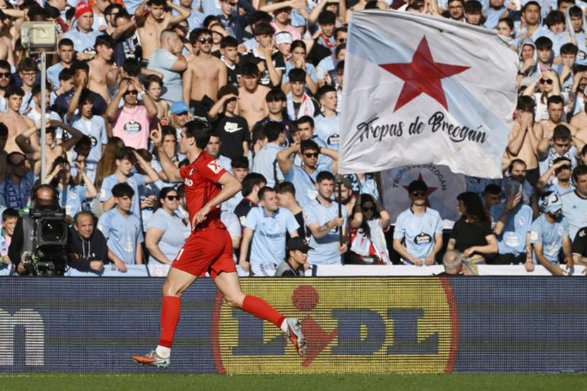 Freiburg's German forward #31 Igor Matanovic celebrates scoring the opening goal during the UEFA Europa League quarter final second leg football match between RC Celta de Vigo and SC Freiburg at Balaidos Stadium in Vigo on April 16, 2026.  Miguel RIOPA / AFP