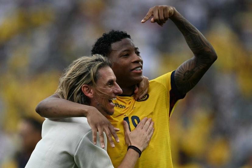 Ecuador's Argentine head coach Sebastian Beccacece and Ecuador's midfielder #19 Gonzalo Plata celebrate after winning the 2026 World Cup Group E football match between Ecuador and Germany at the New York/New Jersey Stadium in East Rutherford on June 25, 2026.  MAURO PIMENTEL / AFP