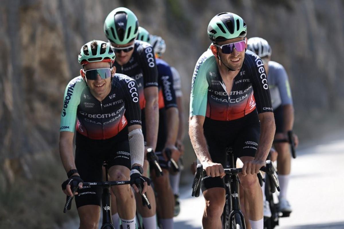 Decathlon CMA CGM Team's French rider Paul Seixas (L) and Decathlon CMA CGM Team's Belgian rider Tiesj Benoot (R) cycle during a team training session on the eve of the start of the 113th edition of the Tour de France cycling race, in Barcelona in northeastern Spain, on July 3, 2026.  Anne-Christine POUJOULAT / AFP
