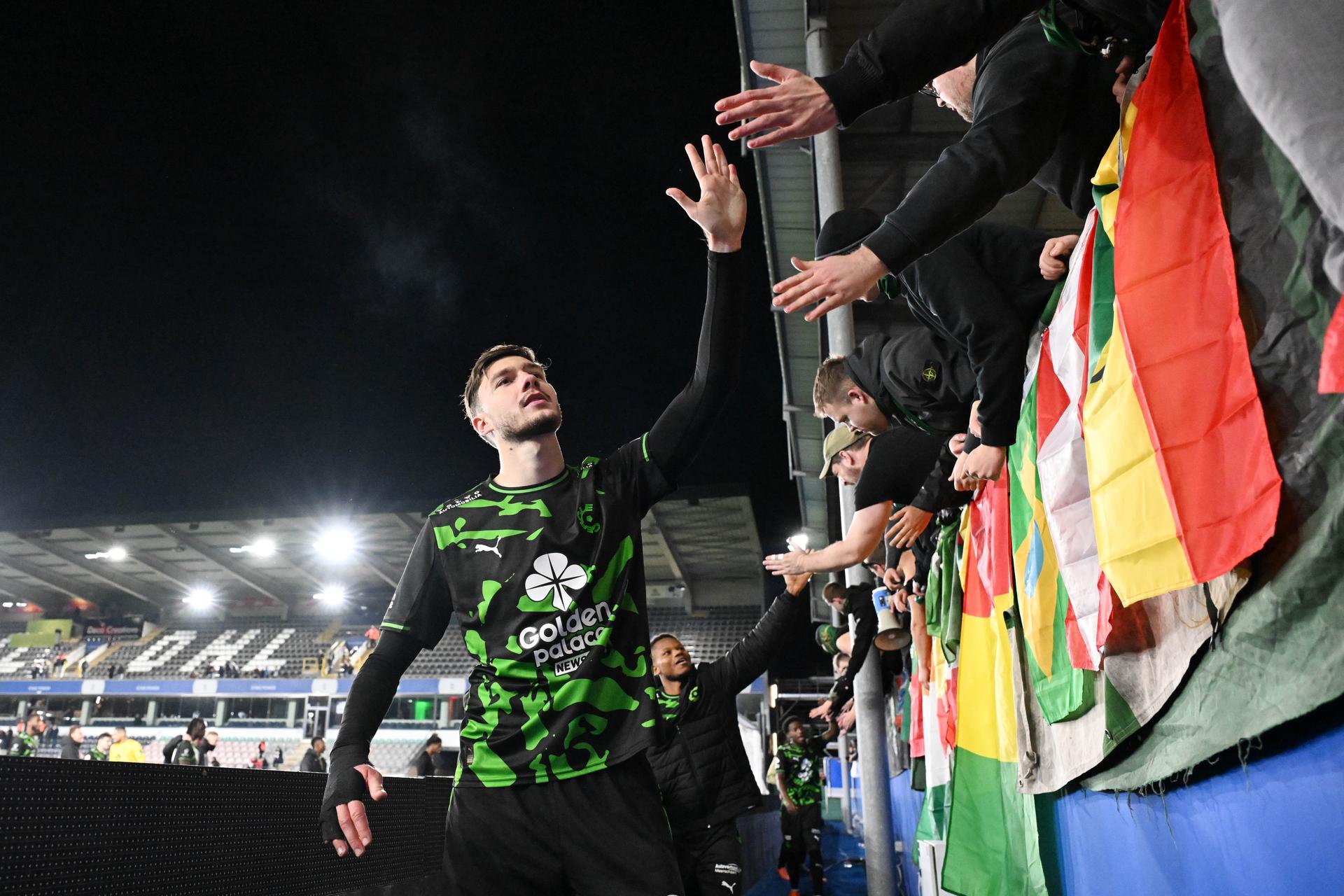 Cercle's Edgaras Utkus celebrates with the fans after a soccer match between Oud-Heverlee Leuven and Cercle Brugge, Sunday 21 December 2025 in Leuven, on day 19 of the 2025-2026 'Jupiler Pro League' first division of the Belgian championship. BELGA PHOTO MAARTEN STRAETEMANS