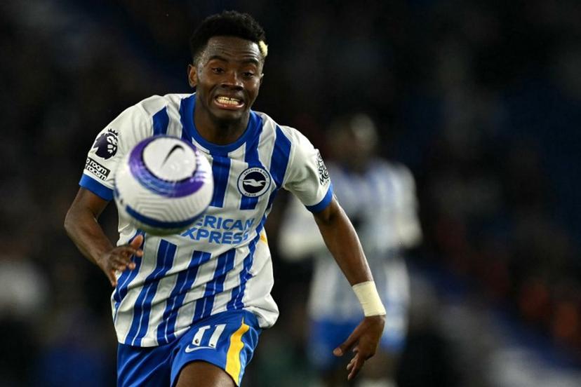 Brighton's Ivorian midfielder #11 Simon Adingra focuses on the ball during the English Premier League football match between Brighton and Hove Albion and Aston Villa at the American Express Community Stadium in Brighton, southern England on April 2, 2025.  Glyn KIRK / AFP