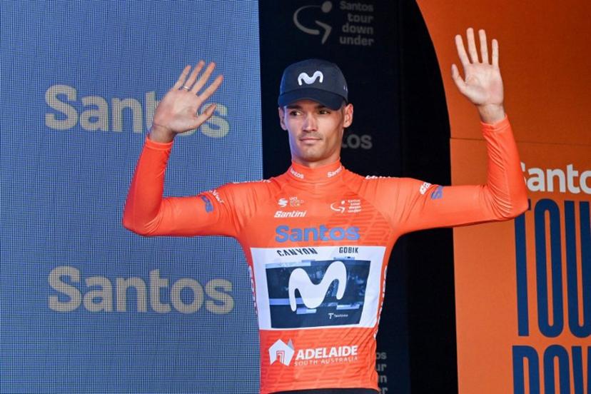 Movistar Team rider Javier Romo Oliver from Spain who holds the leaders ochre jersey reacts on the podium after stage 4 of the Tour Down Under cycling race in Adelaide on January 24, 2025.  Brenton Edwards / AFP