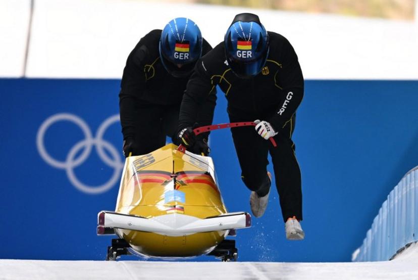 Germany's Francesco Friedrich takes part in the 2-man bobsleigh training at the Yanqing National Sliding Centre during the Beijing 2022 Winter Olympic Games in Yanqing on February 12, 2022.  Daniel MIHAILESCU / AFP