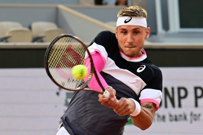Slovakia's Alex Molcan plays a backhand return to Germany's Alexander Zverev during their men's singles match on day five of the Roland-Garros Open tennis tournament at the Court Philippe-Chatrier in Paris on June 1, 2023.  Emmanuel DUNAND / AFP