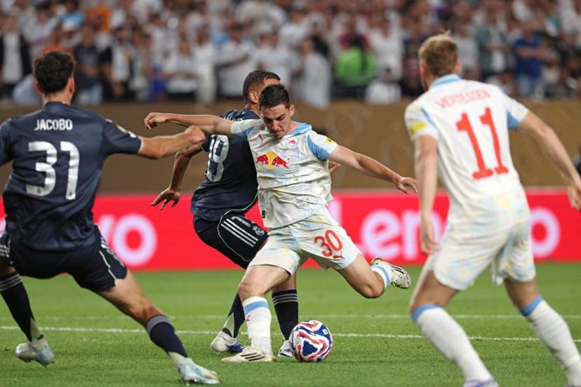 Real Madrid's Spanish defender #31 Jacobo Ramon and Real Madrid's Spanish midfielder #19 Dani Ceballos (2nd L) fights for the ball with Salzburg's Israeli midfielder #30 Oscar Gloukh during the FIFA Club World Cup 2025 Group H football match between Austria's FC Salzburg and Spain's Real Madrid at Lincoln Financial Field Stadium in Philadelphia on June 26, 2025.  FRANCK FIFE / AFP