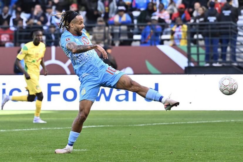 Democratic Republic Of Congo's forward #10 Theo Bongonda scores a goal during the Africa Cup of Nations (CAN) Group D football match between Democratic Republic of Congo and Benin at Al Medina Stadium in Rabat on December 23, 2025.   SEBASTIEN BOZON / AFP