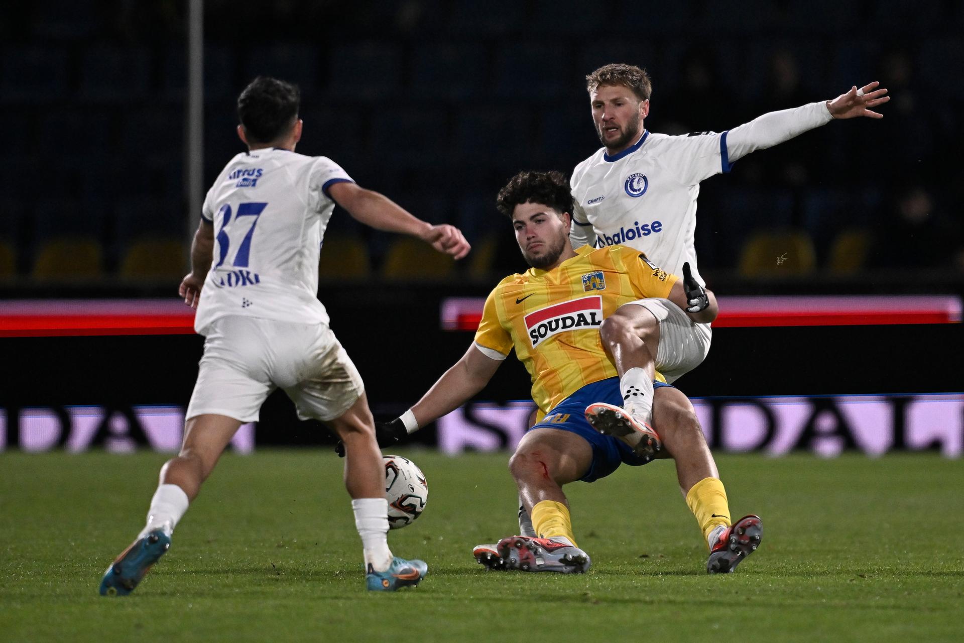 Westerlo's Nacho Ferri and Gent's Siebe Van der Heyden fight for the ball during a soccer match between KVC Westerlo and KAA Gent, Saturday 22 November 2025 in Westerlo, on day 15 of the 2025-2026 'Jupiler Pro League' first division of the Belgian championship. BELGA PHOTO JOHAN EYCKENS