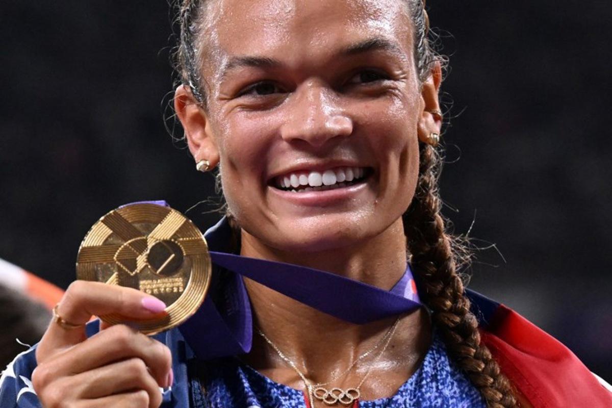 US' Anna Hall celebrates after the women's heptathlon 800m during the World Athletics Championships in Tokyo on September 20, 2025.  Jewel SAMAD / AFP