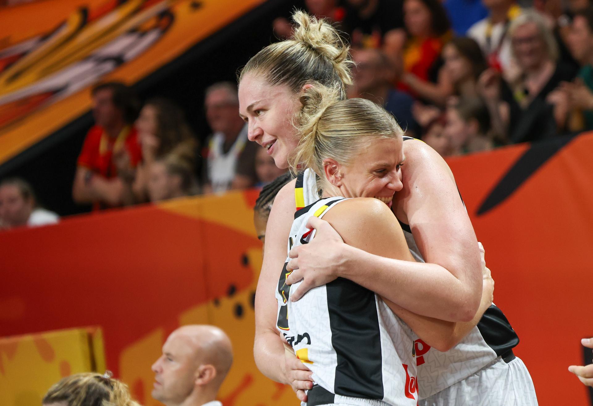 Belgium's Julie Vanloo and Belgium's Emma Meesseman celebrate after winning a game between Belgian national basketball team Belgian Cats and Turkey,  game 1 of the group phase at the FIBA Women's Basketball World Cup, on Friday 4 September 2026, in Berlin, Germany. The FIBA Women's Basketball World Cup takes place in Berlin from 4 to 23 September 2026. BELGA PHOTO VIRGINIE LEFOUR