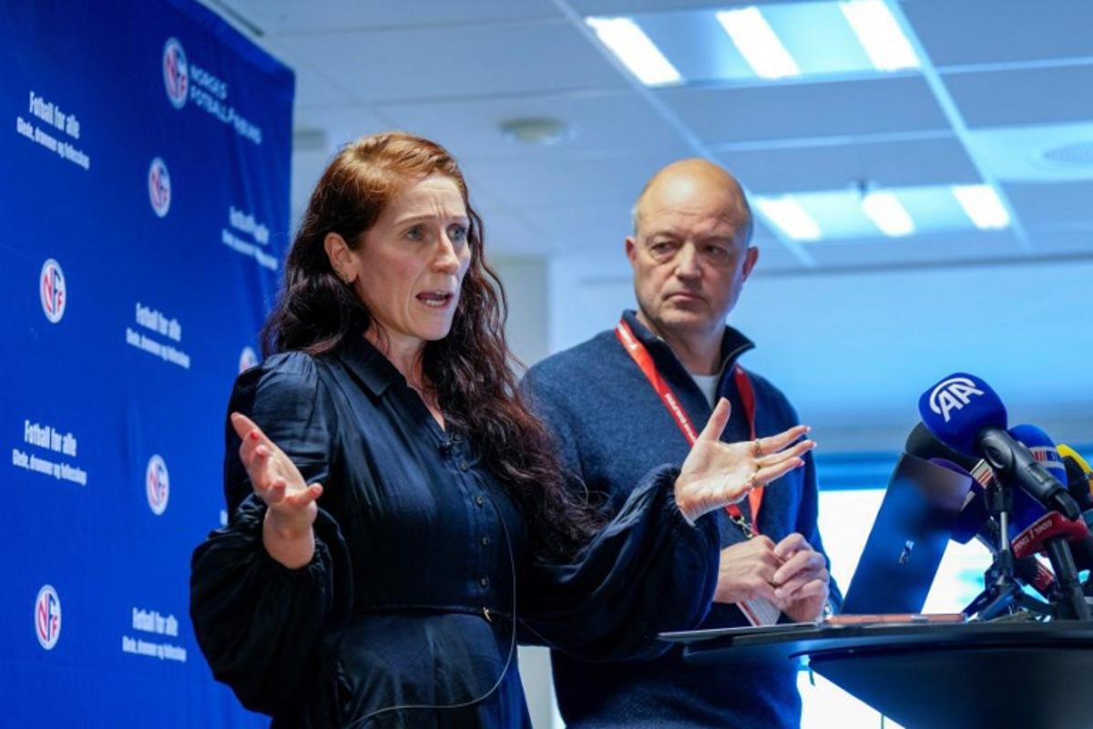 President of the Norwegian Football Association Lise Klaveness and Secretary General of the Norwegian Football Association, Karl-Petter Loken address a press conference of the Norwegian Football Association in Oslo, Norway on October 10, 2025 ahead of the FIFA World Cup 2026 European qualification football match Norway vs Israel to be played at Ullevaal Stadium on October 11.  Fredrik Varfjell / NTB / AFP
