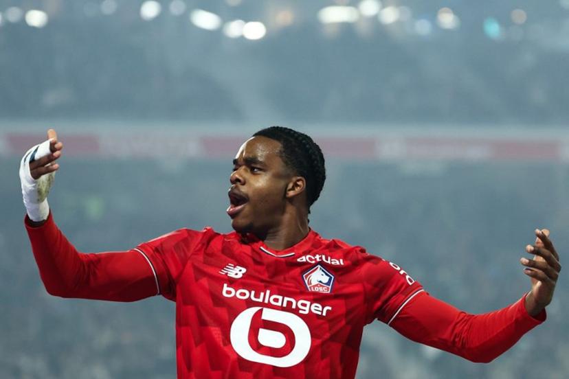 Lille's Belgian defender #03 Nathan Ngoy reacts during the French L1 football match between Lille LOSC and Olympique de Marseille (OM) at the Pierre-Mauroy stadium in Villeneuve-d'Ascq, northern France, on December 5, 2025.  Sameer AL-DOUMY / AFP